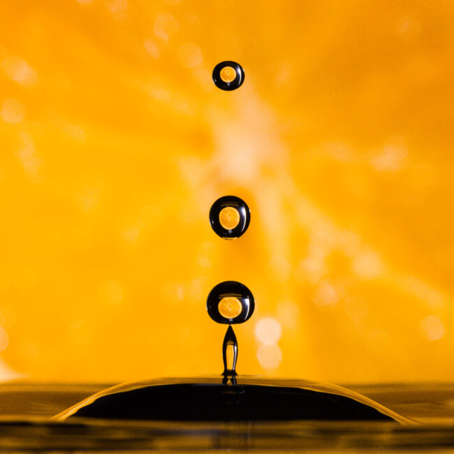 Water droplets with orange background